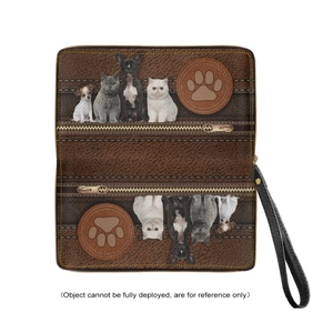 Close-up of brown PU leather long wallet with cat print, wristlet strap, and zipper detail