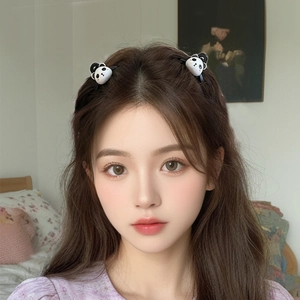 Cute panda hair clips in black and white 3D design shown on a model for sweet daily styling