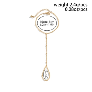 Detail view of gold slave bracelet with dimensions 16+5cm length and 2.4g weight