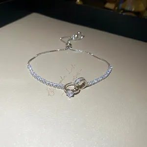 S925 silver tennis bracelet featuring interlocking double rings and heart-shaped zircon