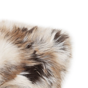 Close-up of thick gradient faux fox fur texture on women winter bucket hat