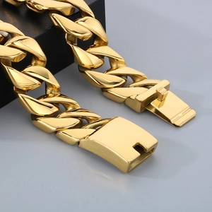 Polished 20mm gold Cuban link chain bracelet with a secure box clasp for men