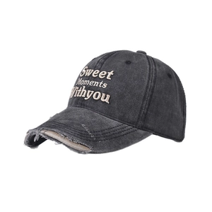 Close-up of distressed vintage baseball cap with Sweet Moments Withyou embroidery