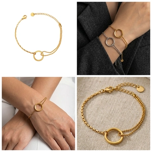 Detailed macro view of 18k gold minimalist geometric circular link bracelet with box chain