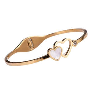 Elegant gold titanium steel hinged bangle with mother of pearl shell and zirconia hearts