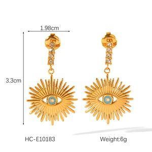 Detailed view of 18k gold evil eye drop earrings with dimensions 1.98cm by 3.3cm