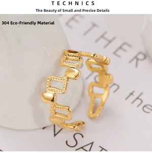Close-up of gold-plated 304 stainless steel ring with irregular geometric cutouts