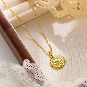 Collier en acier inoxydable plaqué or 18 carats avec pendentif œil bleu maléfique