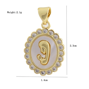 Macro shot of gold mother and child charm with zircon inlay and product dimensions