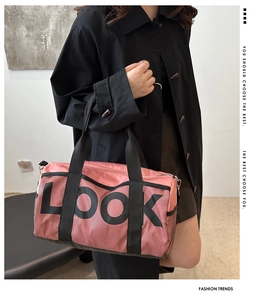 Pink nylon fitness barrel bag with black mesh overlay and LOOK letter print for women