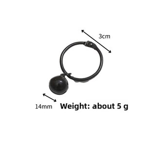 Detail view of a 3cm black metal ring with a 14mm smooth bell pendant for bag DIY