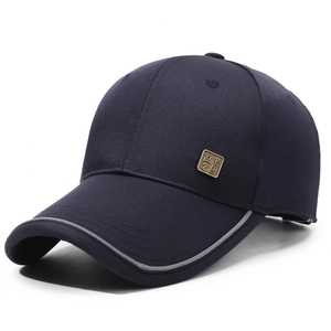 Men's navy blue cotton baseball cap with metal badge and gray brim piping detail