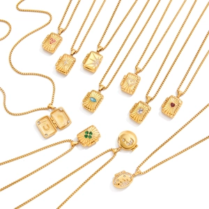 Gold tarot-style locket necklaces in diverse shapes with radiant textures and star motifs