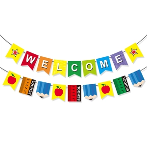 Detail view of Back to School welcome banner with colorful pencil and apple flags
