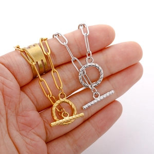 Detail of 18k gold and silver stainless steel OT toggle clasps for DIY jewelry making