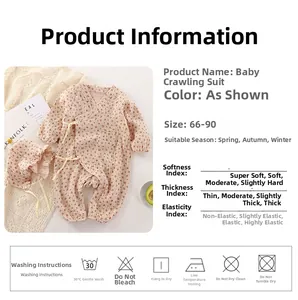 Detail of pink floral baby romper with matching cotton hat and size chart display