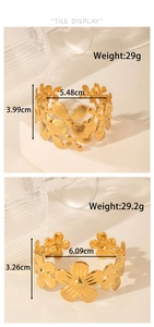 Detailed tile display of two gold stainless steel cuff bracelets with floral patterns