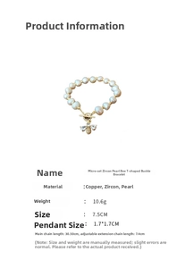 Detail view of bee charm bracelet with zircons, pearls, and a secure T-bar clasp closure