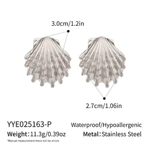 Macro detail of silver shell earrings showing dimensions and hypoallergenic steel texture