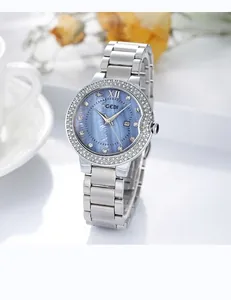 Detail of GEDI quartz watch with silver steel strap, rhinestone bezel and blue dial