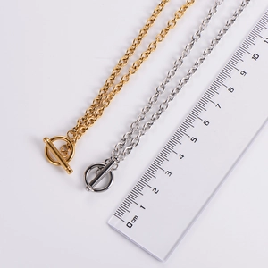 Minimalist OT toggle clasp necklaces in 18k gold and silver plating with ruler measurement