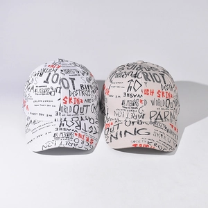 Graffiti print baseball cap in white and beige cotton with trendy street style designs