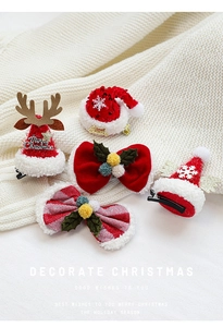 Détail de barrettes de Noël avec paillettes, bois de renne et mini bonnet de Noël