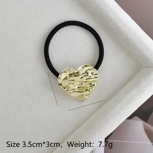 U-shaped alloy ponytail holder with golden heart lava texture and elastic hair tie