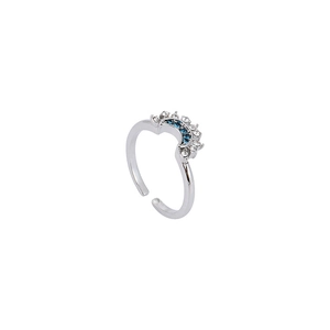 Minimalist silver sun and moon stacking ring with blue and clear rhinestones