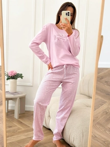 Pink long sleeve pajama set with Believe in yourself graphic and plaid pants