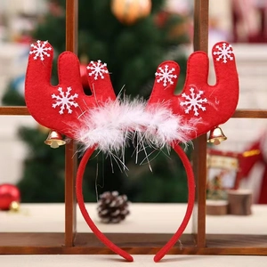 Christmas reindeer antler headband in red with white snowflake patterns and small gold bells