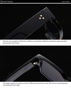Detail view of glossy black square sunglasses with size specs and metal hinges