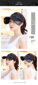 Detail view of adjustable side sun visors and breathable mesh on black empty top sport cap