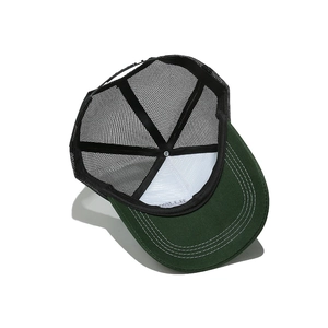 Top view of retro trucker hat showing interior lining, mesh panels and stitched brim