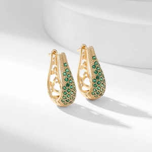 Elegant gold plated hoop earrings with emerald green zircon paving and hollow heart detail