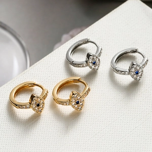 Luxuriöse Evil Eye Creolen in Gold und Silber mit funkelnden Zirkonia-Kristallen