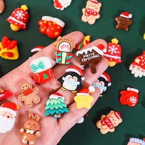 DIY Christmas resin charms featuring Santa, gingerbread man and reindeer in festive colors