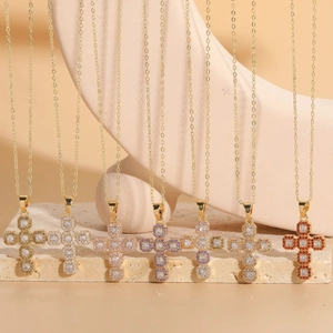 Detail of cross pendants with 14K gold plating and colorful zircon stones in seven colors