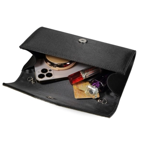 Interior view of black evening clutch bag showing capacity for phone and cosmetics