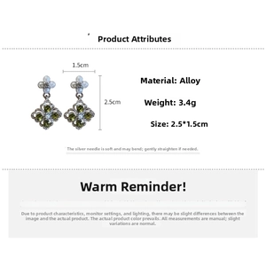 Detailed view showing the olive green crystal and pearl flower earring with size dimensions