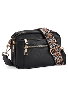 Detail of black multi-zipper crossbody bag with ethnic patterned jacquard wide strap