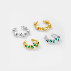 Set of four S925 sterling silver ear cuffs in gold and silver with emerald and white zircon