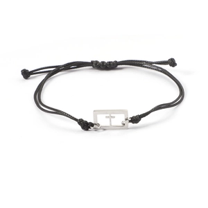 Macro detail of hand-woven black cord bracelet featuring a silver hollow cross charm