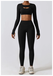 Detail view of black cut-out yoga shrug with high-elasticity fabric for fitness