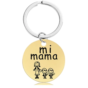Detailed engraving of 'mi mama' and cartoon figures on golden stainless steel keychain