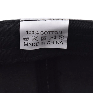 Detail of 100% cotton wash label and care instructions inside New York baseball cap