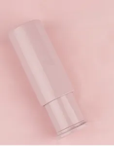 Detail of pink retractable makeup brush with protective cap for clean dust-free storage