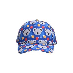 Detail of navy blue kids baseball cap with festive koala and snowflake patterns