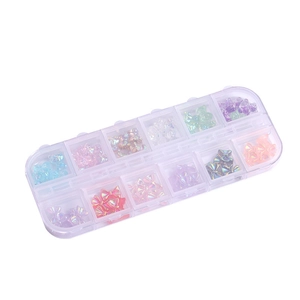 12-grid organizer box with colorful resin butterfly and flower nail art charms