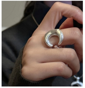 Macro detail of the S925 sterling silver ring featuring a unique matte textured finish
